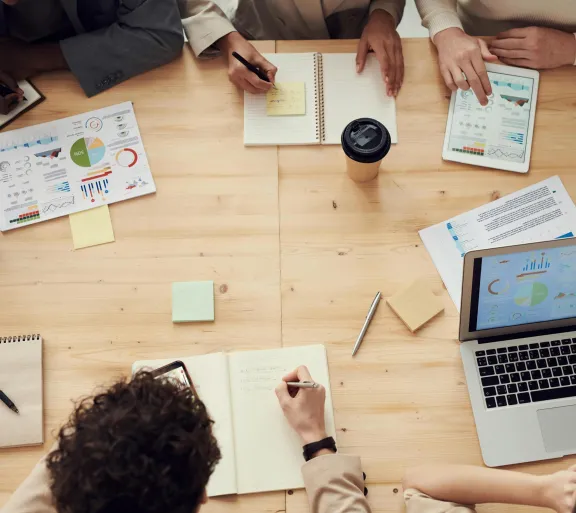 overhead view of people working at a table