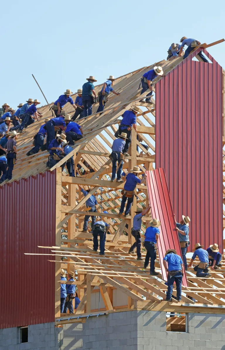 volunteers building a house