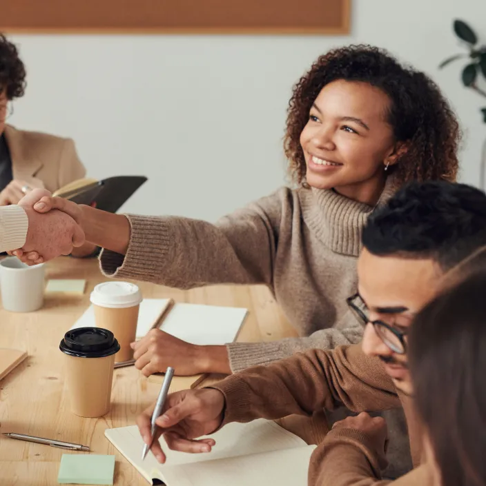 black woman shaking hands