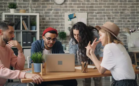 people all around a computer